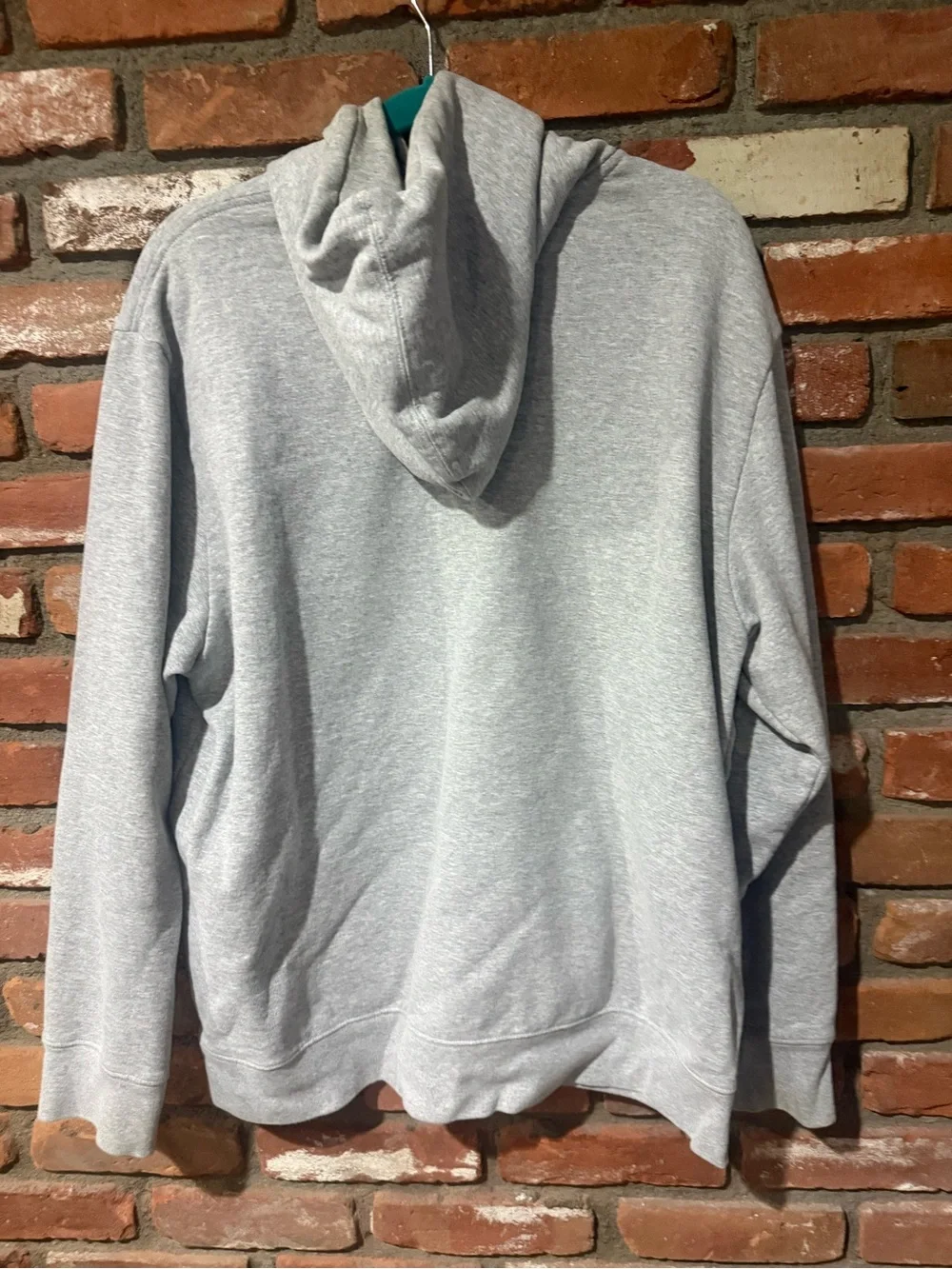 The North Face Light Gray Hoodie with Burgundy Logo and Drawstrings